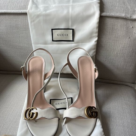 A thick heel balances these Gucci leather
sandals with a retro touch. - Picture 5 of 10